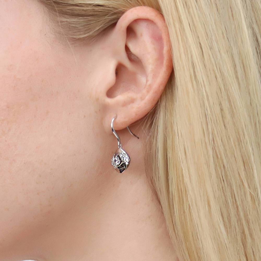 Model wearing Woven CZ Fish Hook Dangle Earrings in Sterling Silver