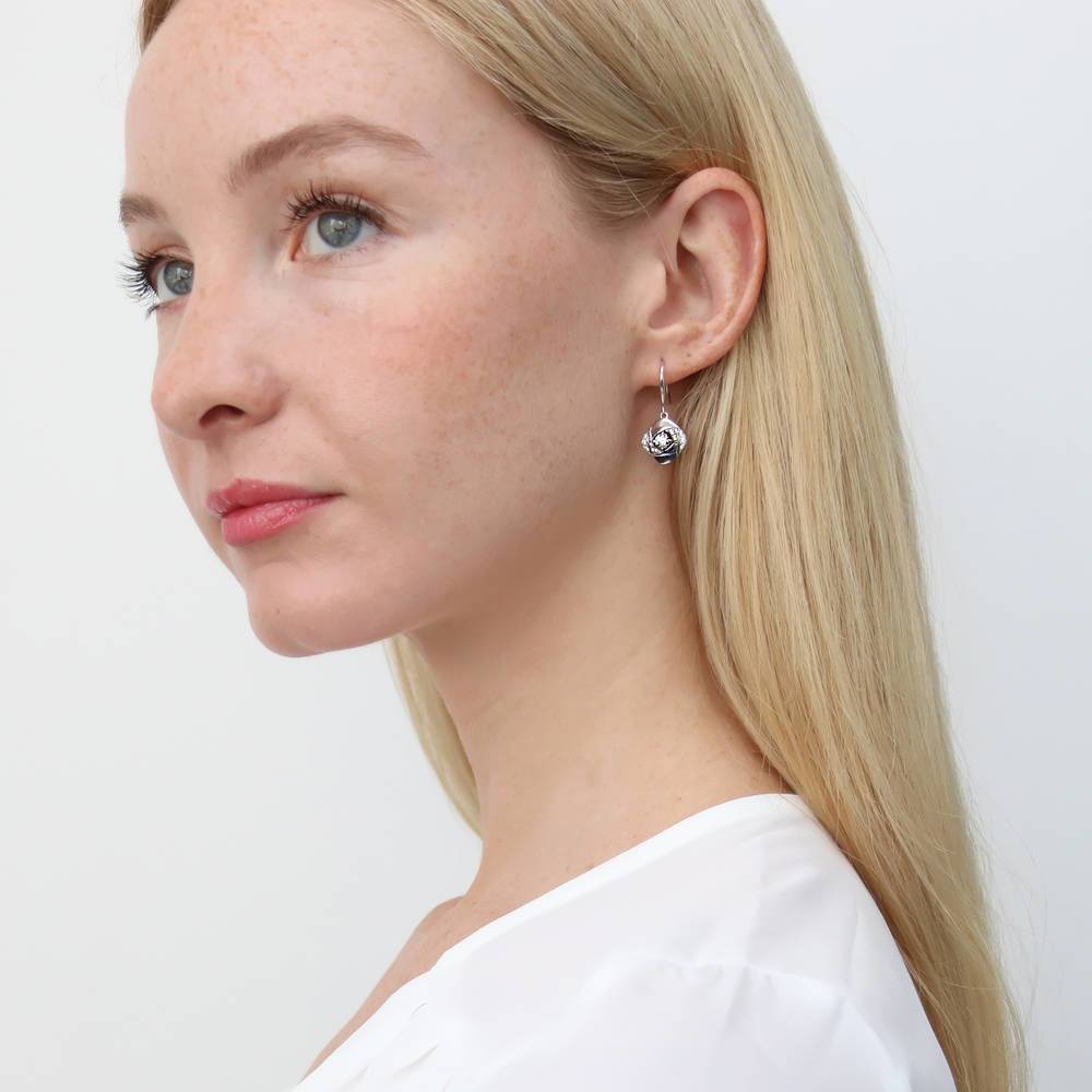 Model wearing Woven CZ Fish Hook Dangle Earrings in Sterling Silver