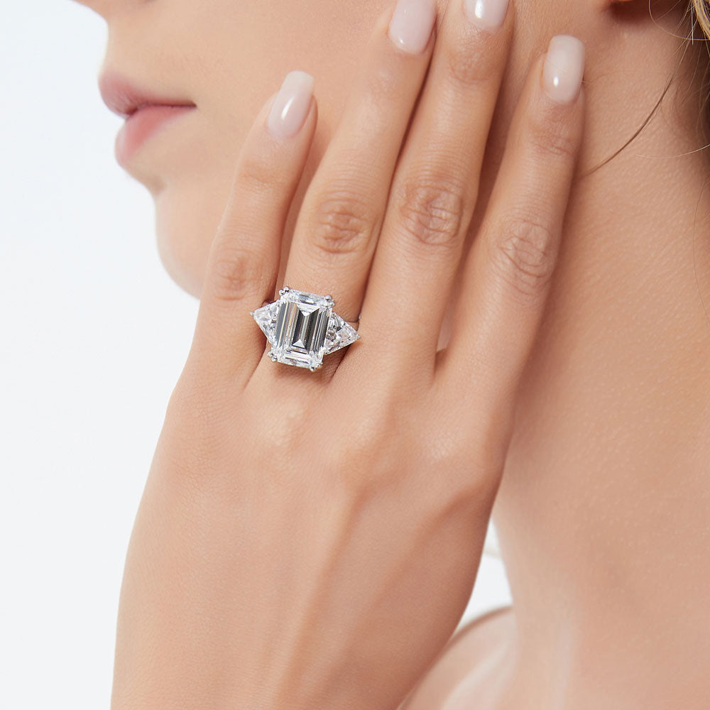 Model wearing 3-Stone Emerald Cut CZ Statement Ring in Sterling Silver