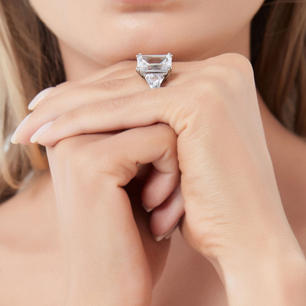 Model wearing 3-Stone Emerald Cut CZ Statement Ring in Sterling Silver