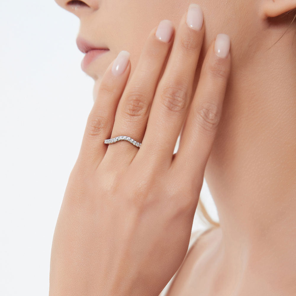 Model wearing Woven Wishbone Pave Set CZ Curved Half Eternity Ring in Sterling Silver
