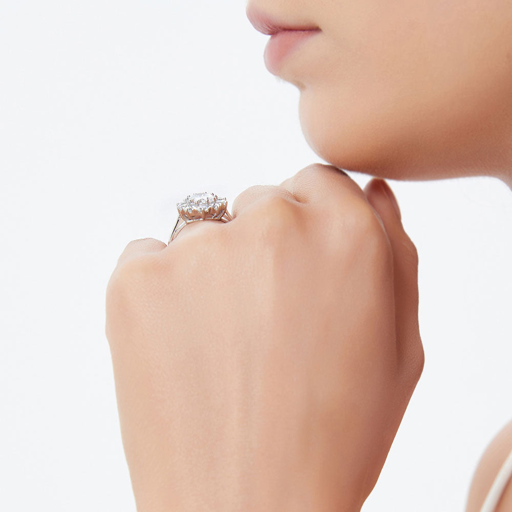 Model wearing Flower Halo CZ Statement Ring in Sterling Silver