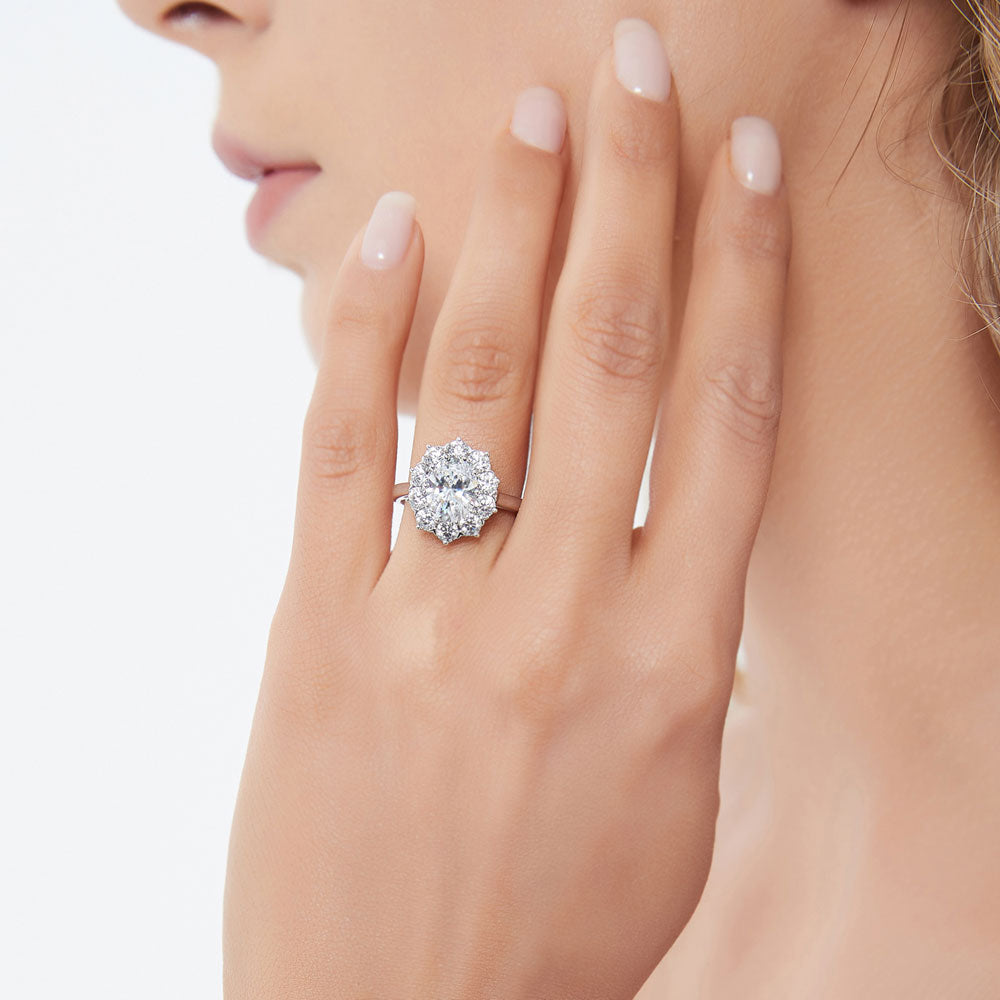 Model wearing Flower Halo CZ Statement Ring in Sterling Silver