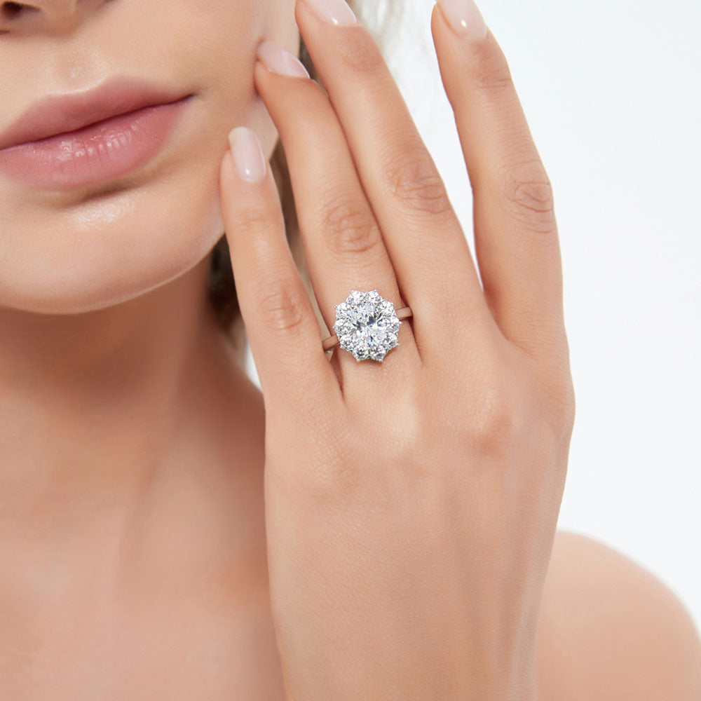 Model wearing Flower Halo CZ Statement Ring in Sterling Silver