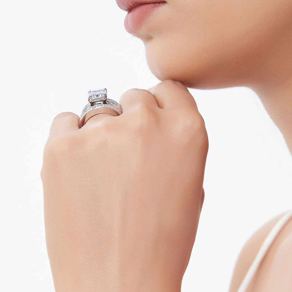 Model wearing Solitaire 3.8ct Emerald Cut CZ Statement Ring Set in Sterling Silver