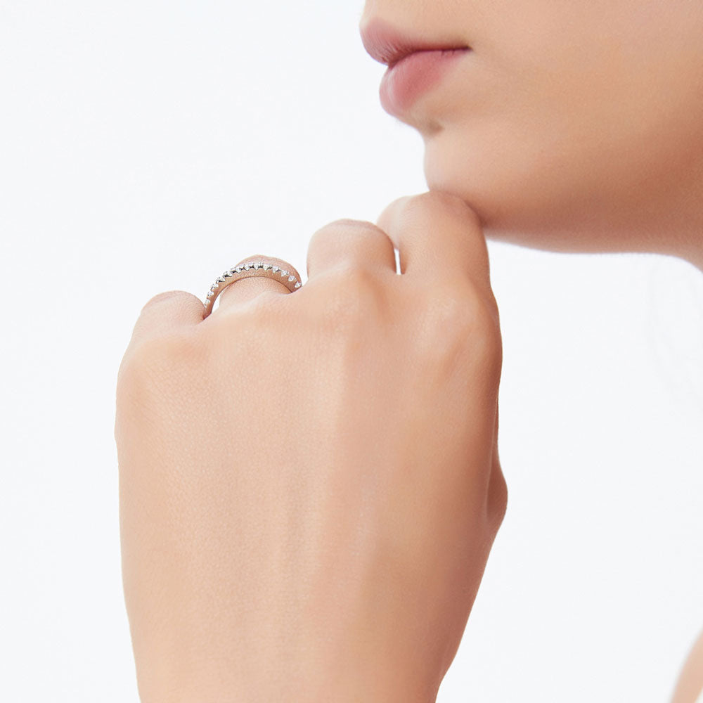 Model wearing Solitaire 2.6ct Emerald Cut CZ Ring Set in Sterling Silver