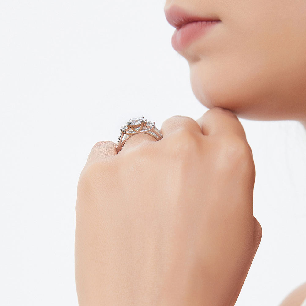 Model wearing 3-Stone Round CZ Ring in Sterling Silver