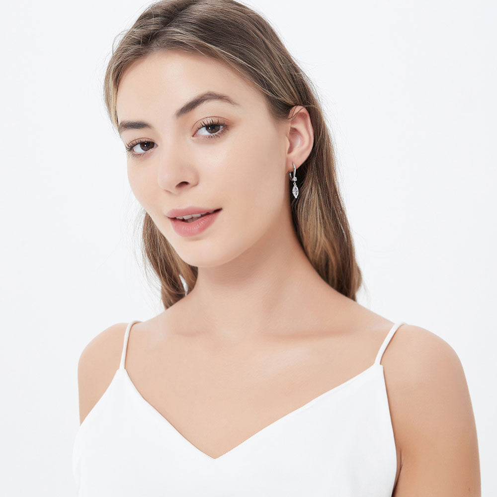 Model wearing Solitaire 2ct Marquise CZ Leverback Dangle Earrings in Sterling Silver