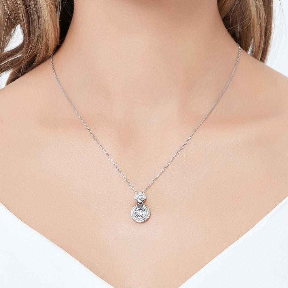 Model wearing 2-Stone Cable CZ Pendant Necklace in Sterling Silver