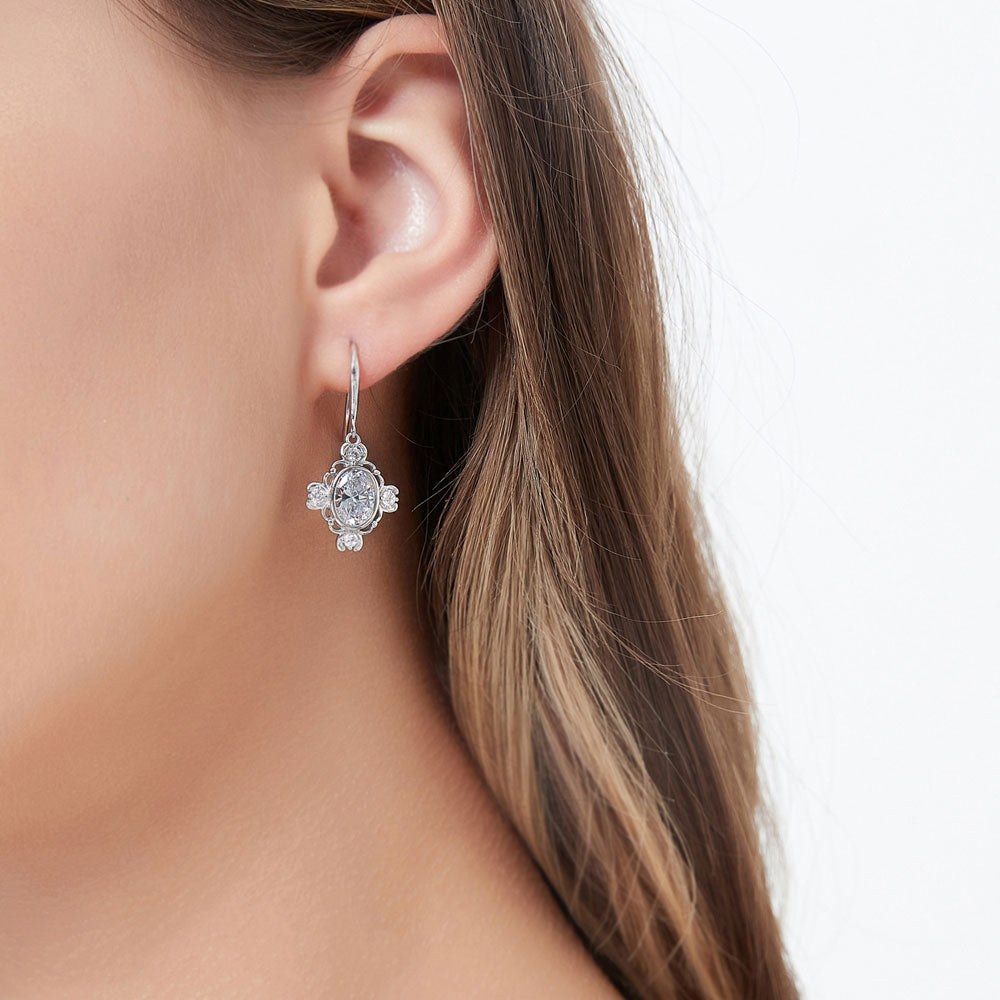 Model wearing Flower Art Deco CZ Necklace and Earrings Set in Sterling Silver