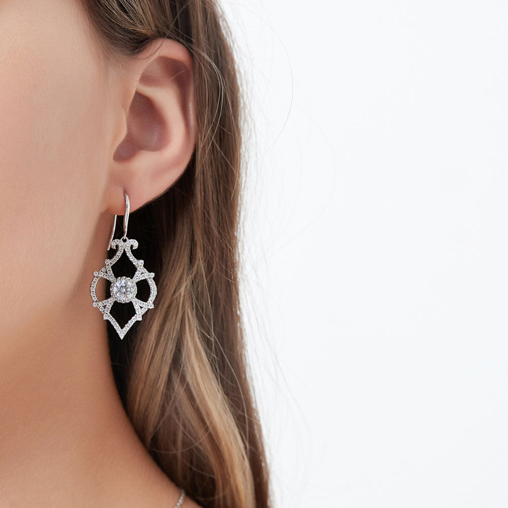 Model wearing Woven Art Deco CZ Fish Hook Chandelier Earrings in Sterling Silver