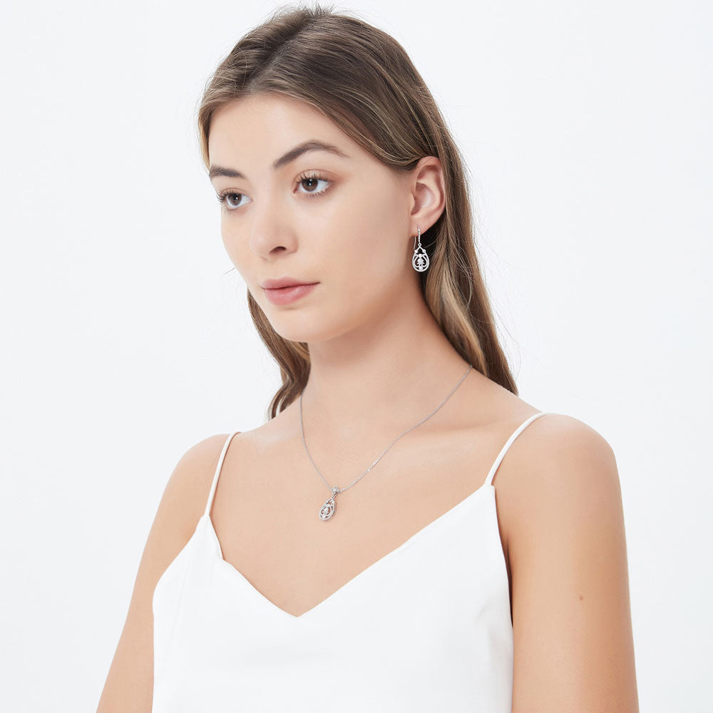 Model wearing Art Deco Milgrain CZ Necklace and Earrings Set in Sterling Silver