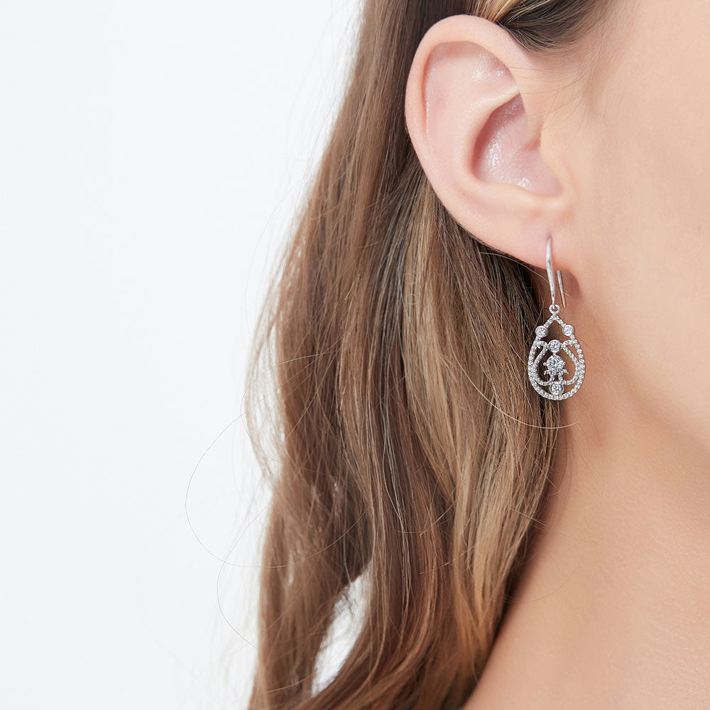 Model wearing Milgrain Art Deco CZ Fish Hook Dangle Earrings in Sterling Silver