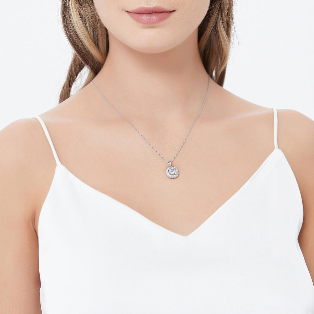 Model wearing Halo Woven Cushion CZ Necklace and Earrings Set in Sterling Silver