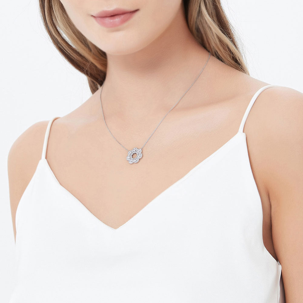 Model wearing 7-Stone Wreath CZ Pendant Necklace in Sterling Silver