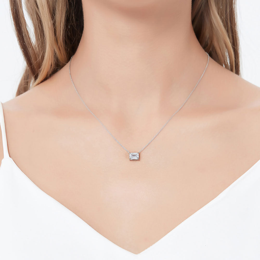 Model wearing Solitaire East-West 1.7ct Emerald Cut CZ Necklace in Sterling Silver