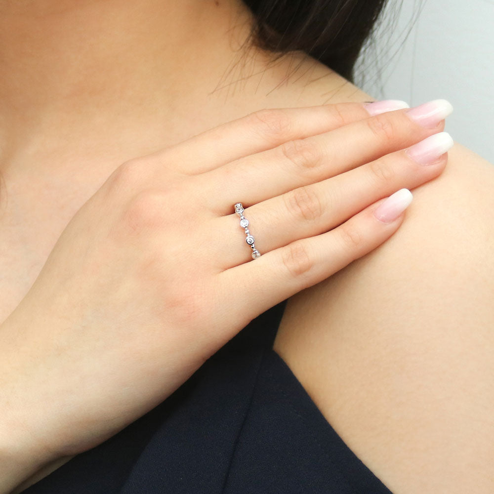 Model wearing Bubble Bead Bezel Set CZ Half Eternity Ring in Sterling Silver