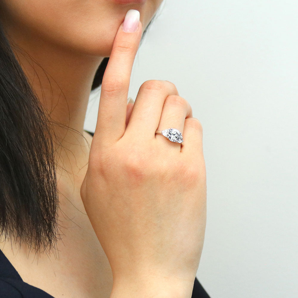 Model wearing 3-Stone Round CZ Ring in Sterling Silver