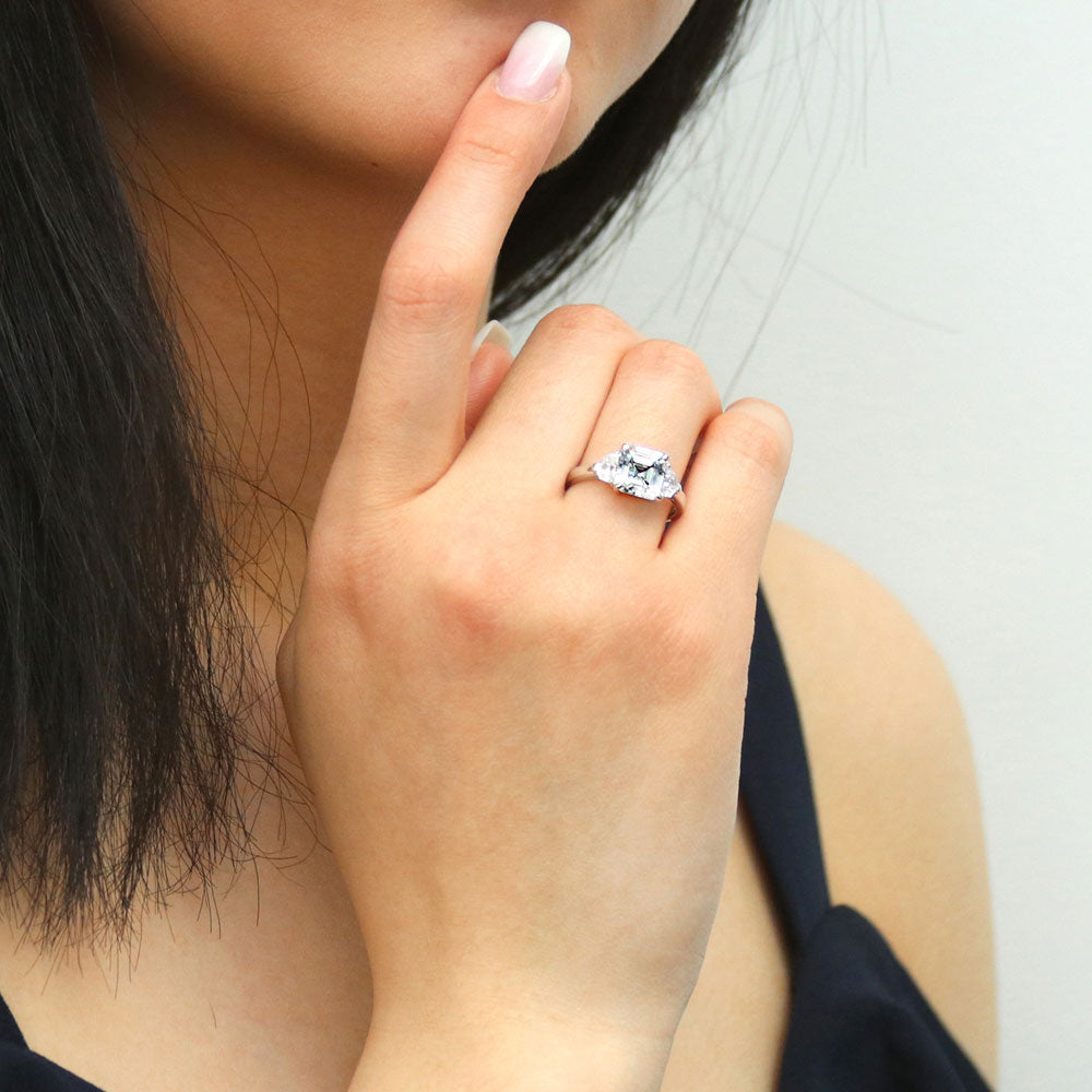 Model wearing 3-Stone Asscher CZ Ring in Sterling Silver