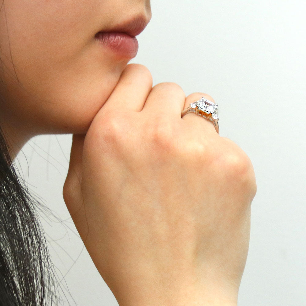 Model wearing 3-Stone Asscher CZ Ring in Sterling Silver