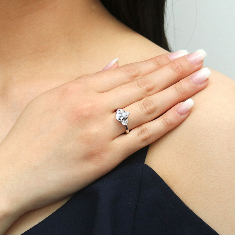 Model wearing 3-Stone Pear CZ Ring in Sterling Silver