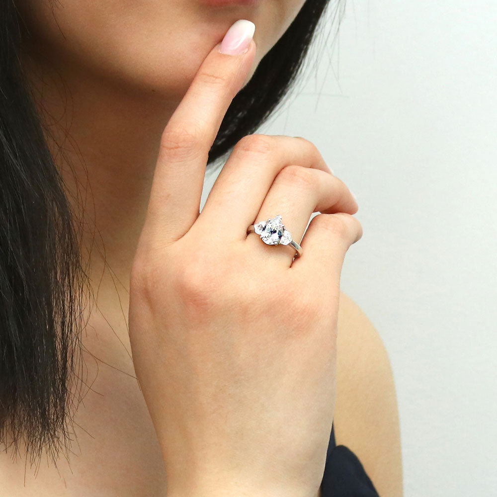 Model wearing 3-Stone Pear CZ Ring in Sterling Silver