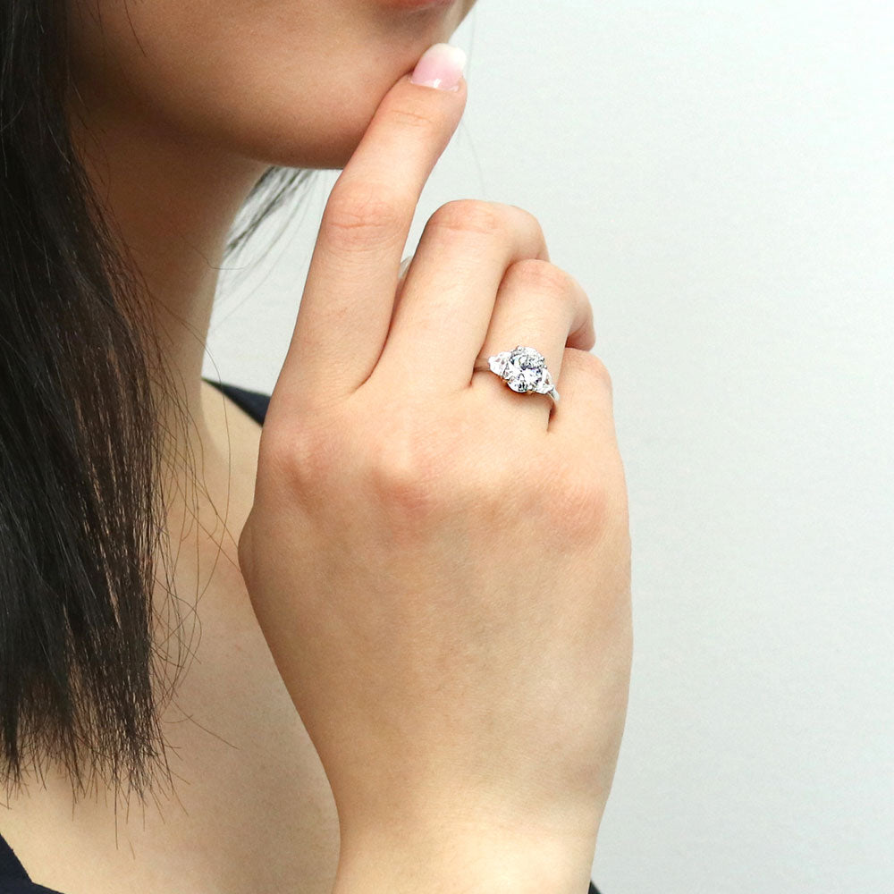 Model wearing 3-Stone Oval CZ Ring in Sterling Silver