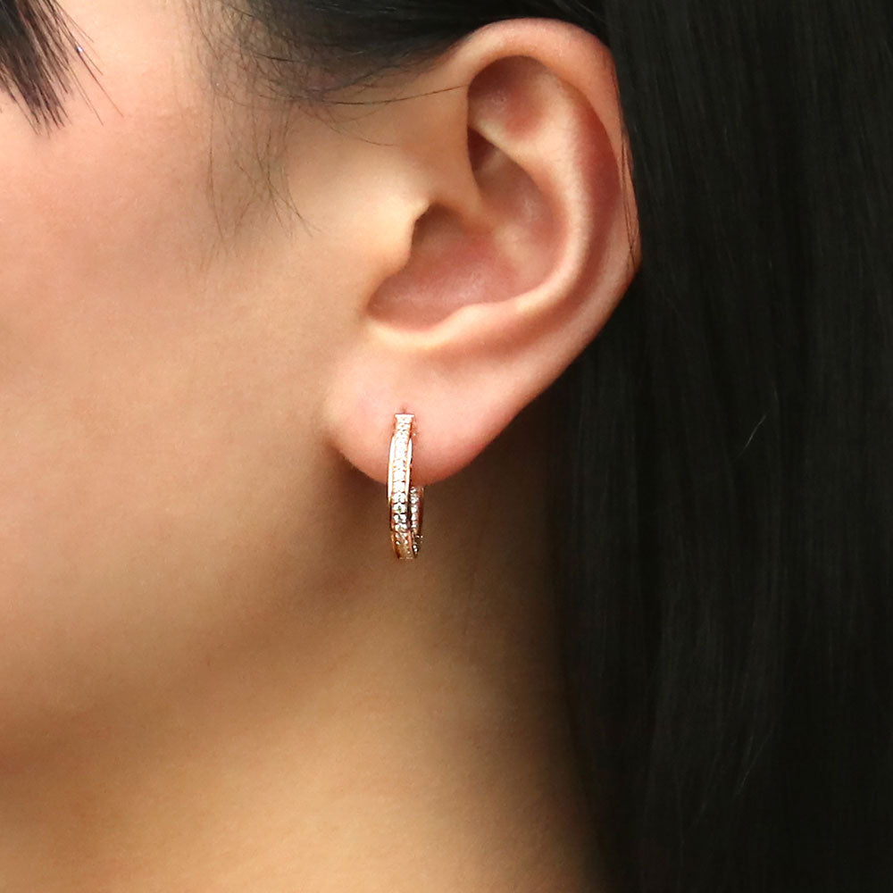 Model wearing Bar CZ Medium Inside-Out Hoop Earrings in Sterling Silver 0.75 inch