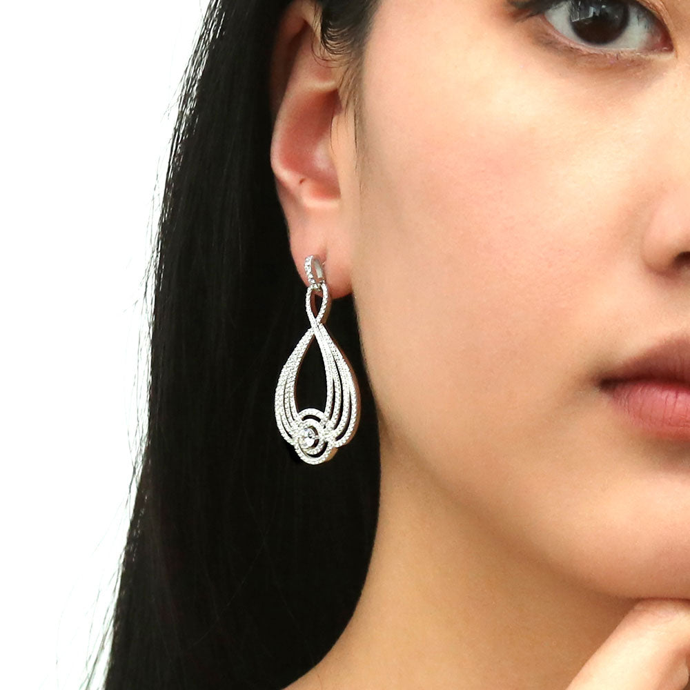 Model wearing Woven CZ Statement Chandelier Earrings in Sterling Silver