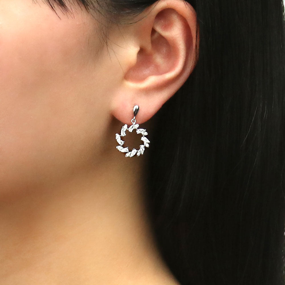 Model wearing Wreath Open Circle CZ Dangle Earrings in Sterling Silver