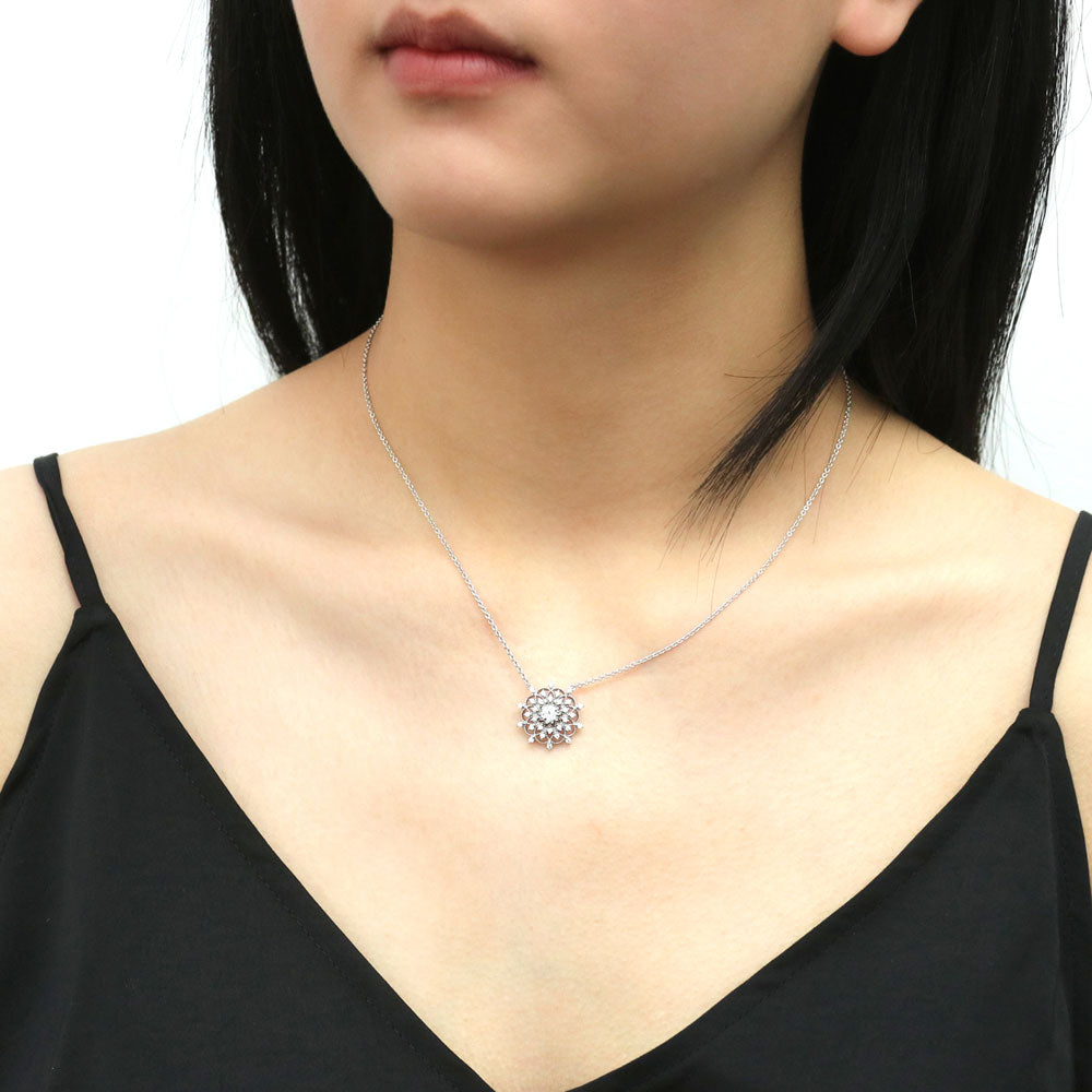 Model wearing Flower CZ Pendant Necklace in Sterling Silver