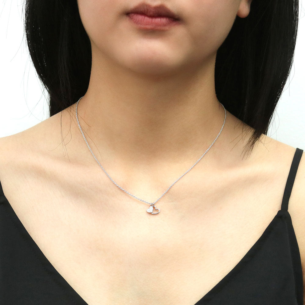 Model wearing Open Heart CZ Pendant Necklace in Sterling Silver