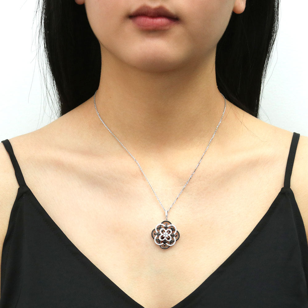 Model wearing Flower Black and White CZ Statement Pendant Necklace in Sterling Silver