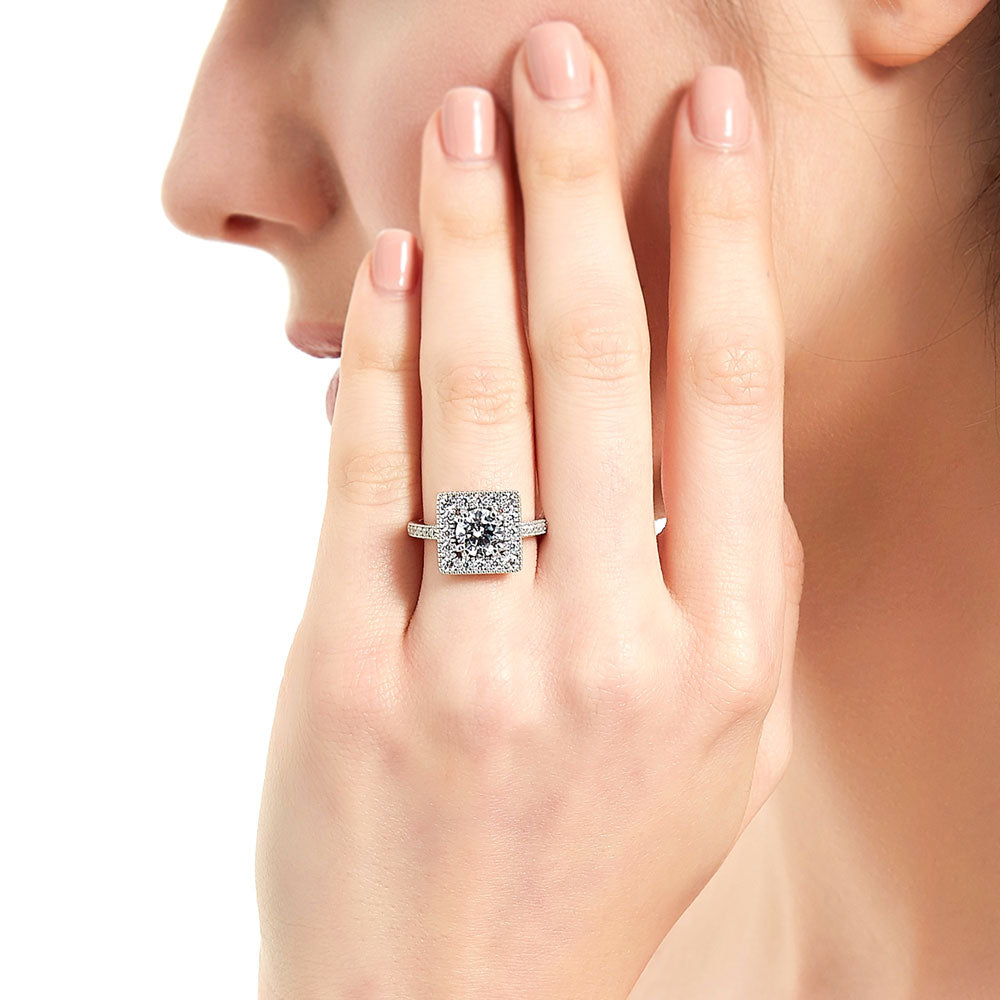 Model wearing Halo Round CZ Ring in Sterling Silver