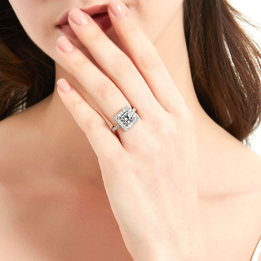 Model wearing Halo Round CZ Ring in Sterling Silver