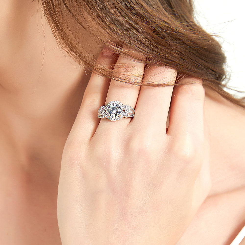 Model wearing Halo Woven Round CZ Statement Ring in Sterling Silver