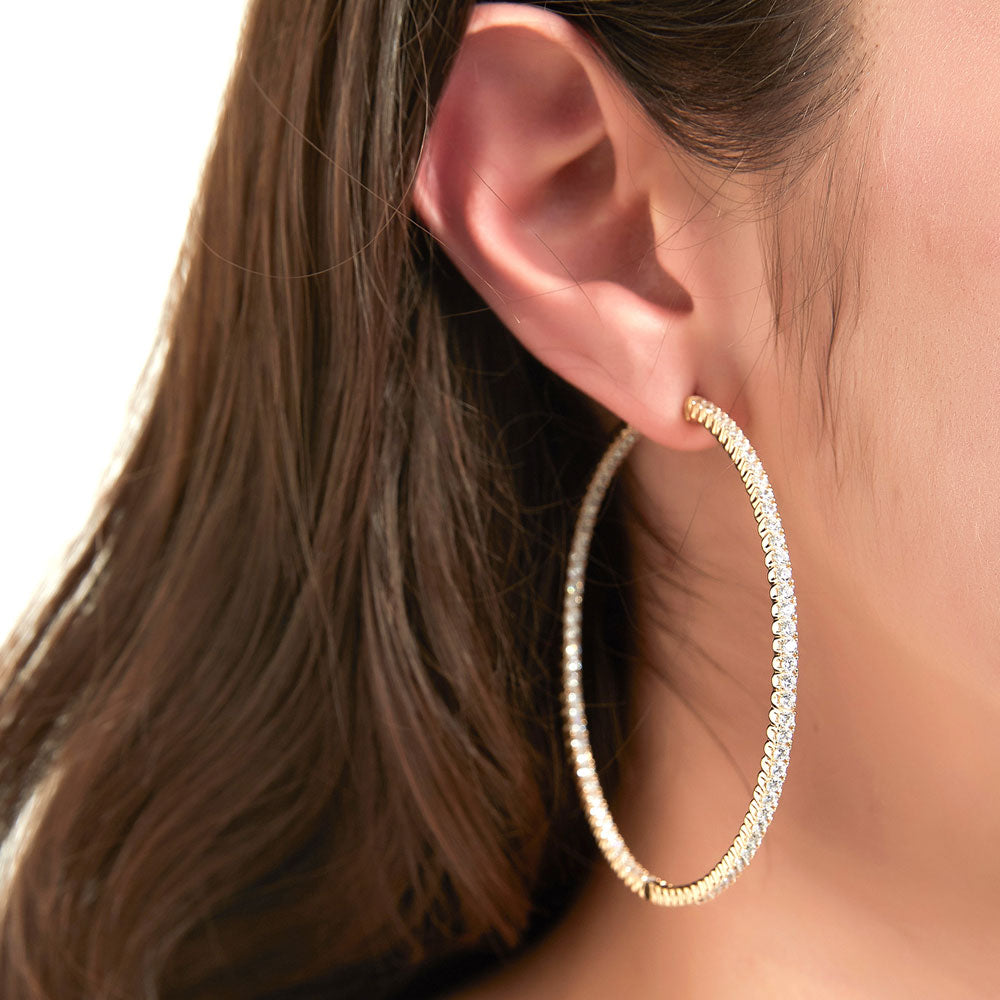 Model wearing CZ Large Inside-Out Hoop Earrings in Sterling Silver 2.5 inch