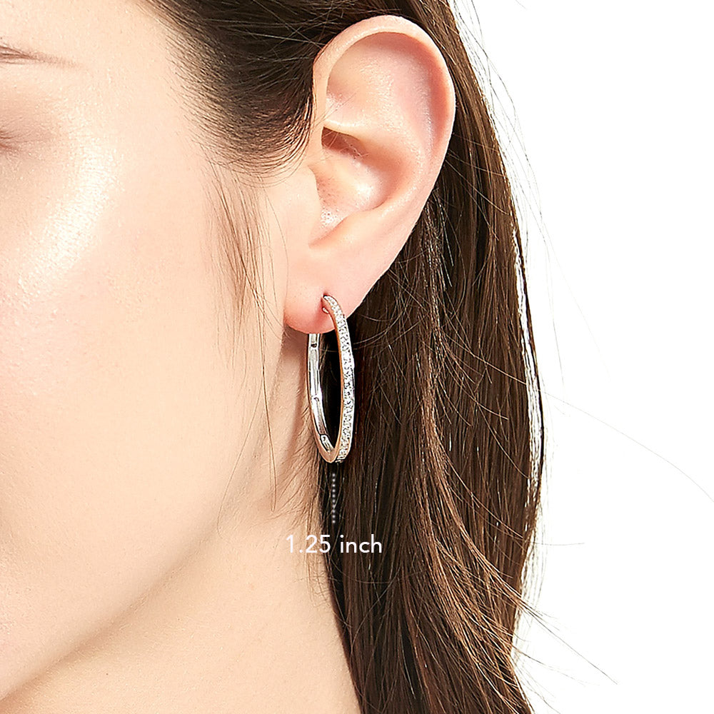 Model wearing Bar CZ Hoop Earrings in Sterling Silver