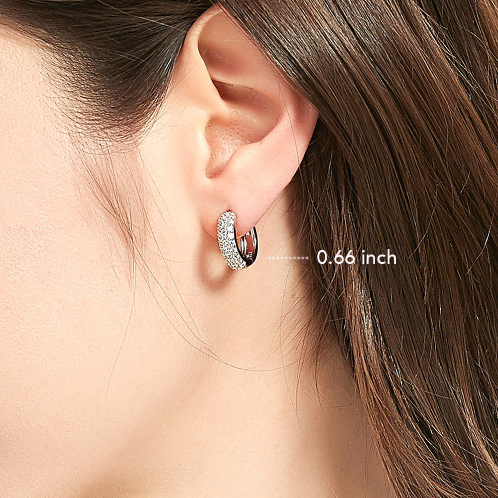 Model wearing Dome CZ Small Hoop Earrings in Sterling Silver, 0.66 inch