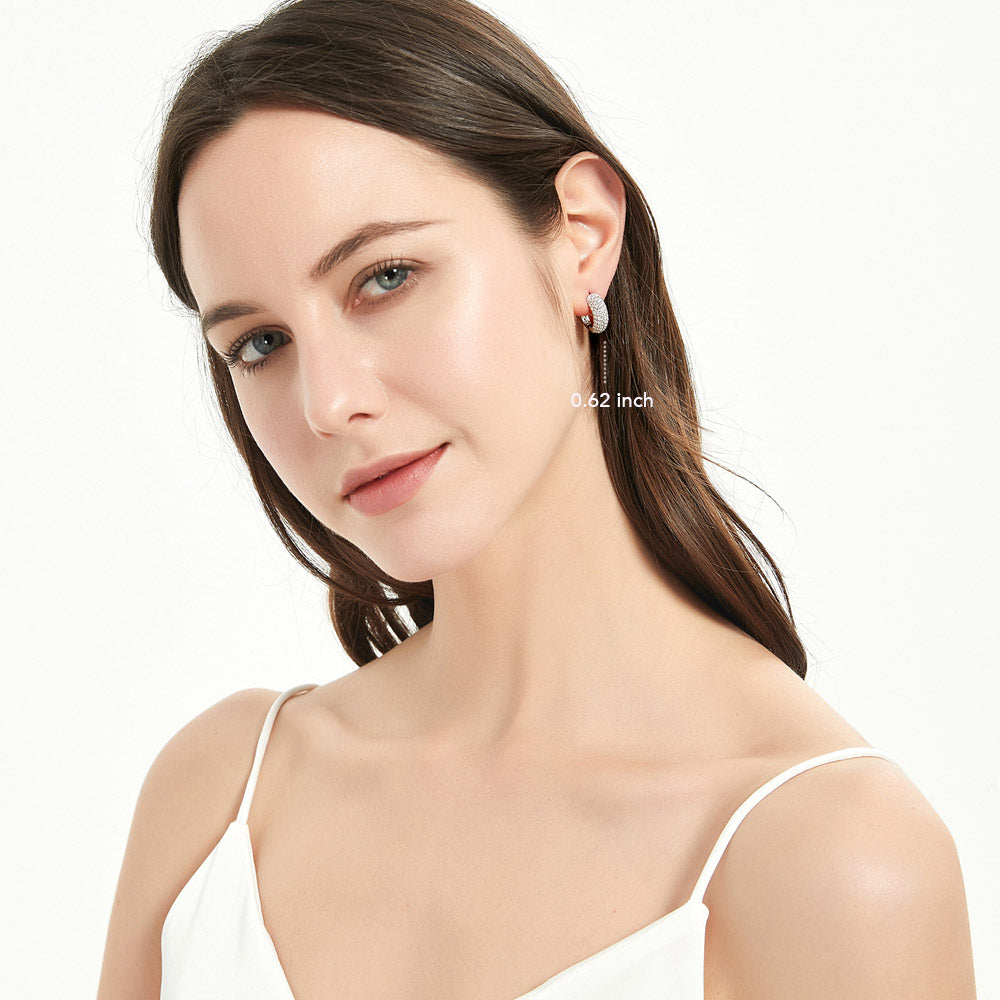 Model wearing Dome CZ Hoop Earrings in Sterling Silver