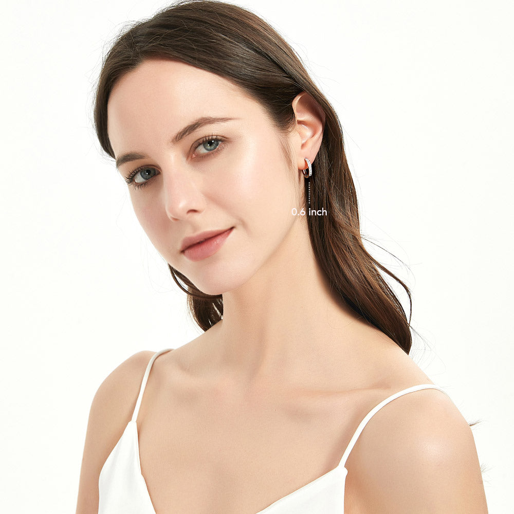 Model wearing Bar CZ Hoop Earrings in Sterling Silver