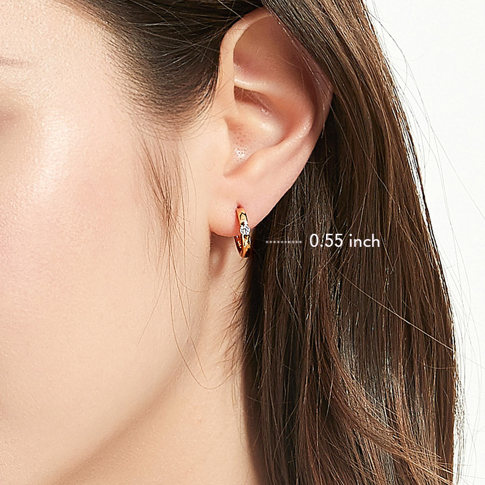 Model wearing Solitaire Round CZ Hoop Earrings in Gold Flashed Sterling Silver 0.12ct, 7 of 11