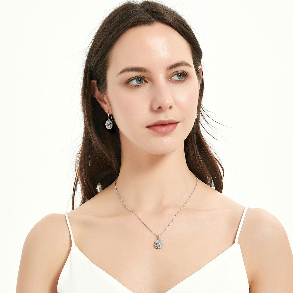 Model wearing Art Deco CZ Fish Hook Dangle Earrings in Sterling Silver