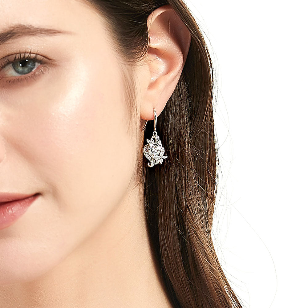 Model wearing Flower Heart CZ Necklace and Earrings Set in Sterling Silver
