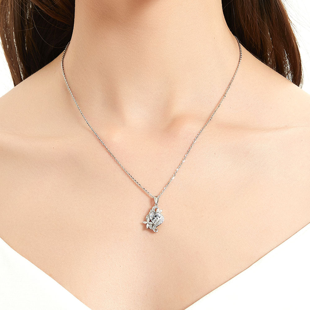 Model wearing Flower Heart CZ Necklace and Earrings Set in Sterling Silver
