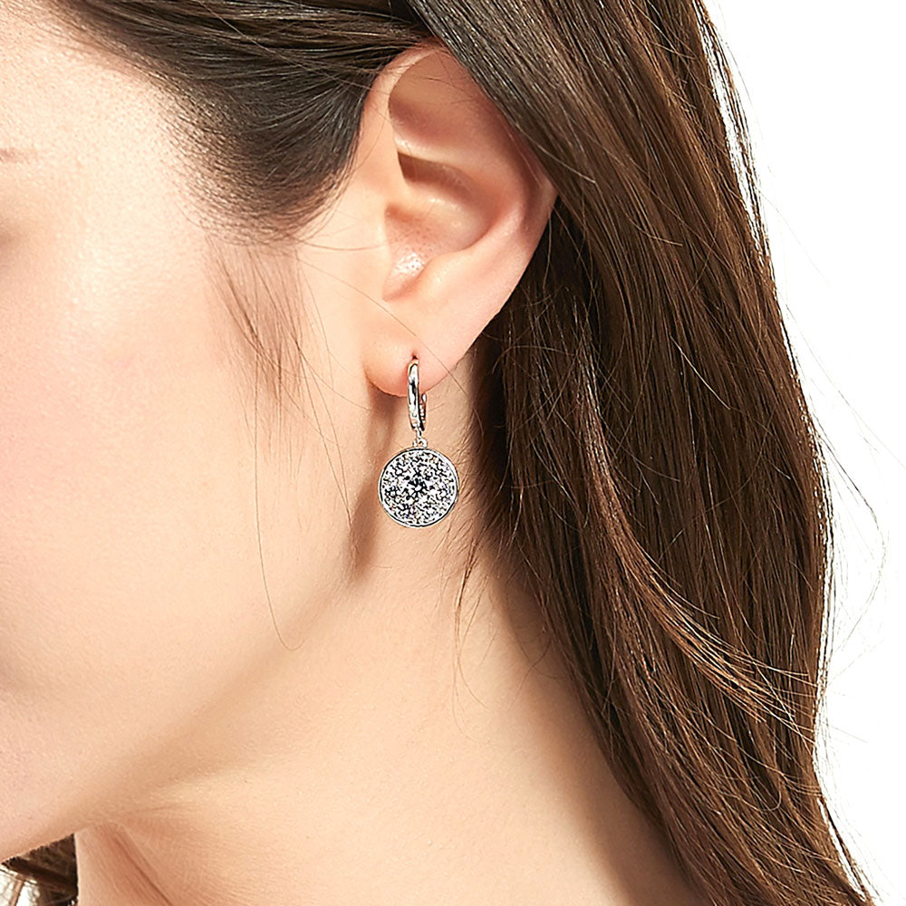 Model wearing Flower Halo CZ Dangle Earrings in Sterling Silver