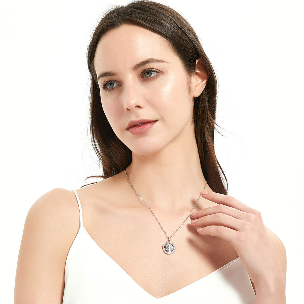 Model wearing Flower Medallion CZ Pendant Necklace in Sterling Silver