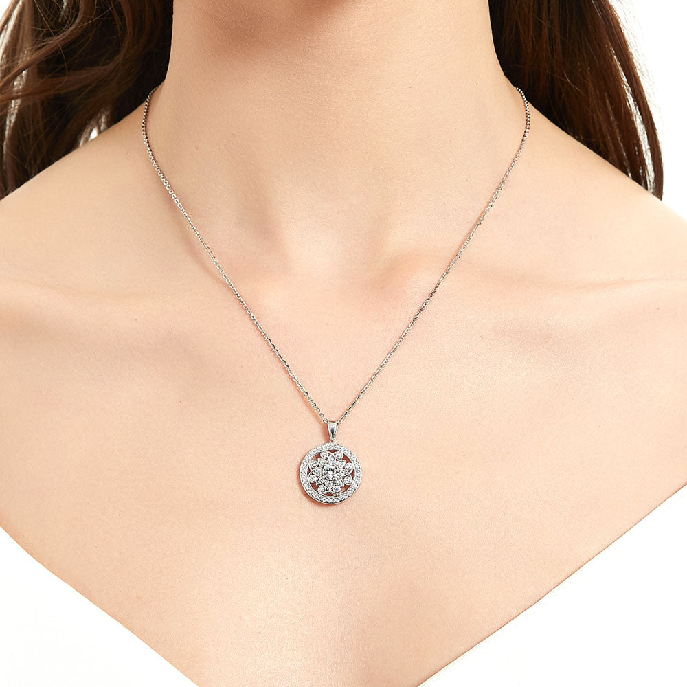Model wearing Flower Medallion CZ Necklace and Earrings Set in Sterling Silver