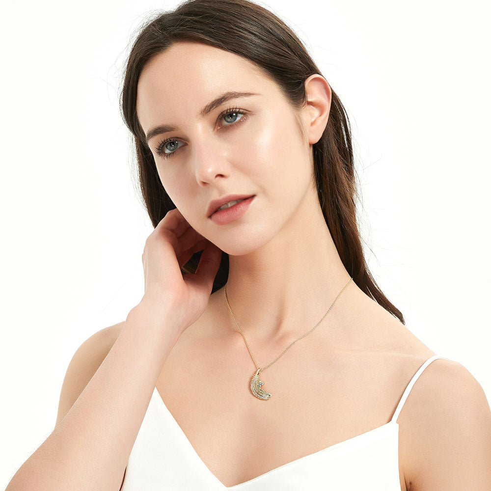 Model wearing Feather CZ Pendant Necklace in Gold Flashed Sterling Silver