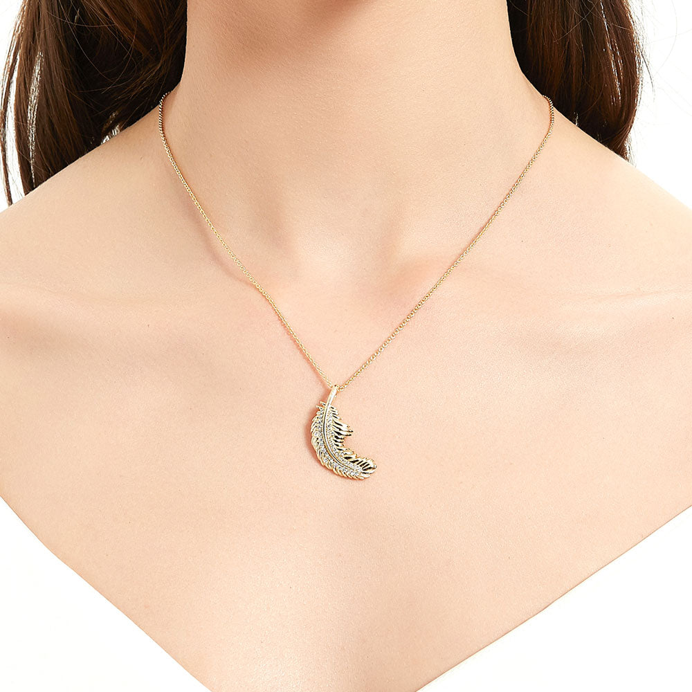 Model wearing Feather CZ Pendant Necklace in Gold Flashed Sterling Silver